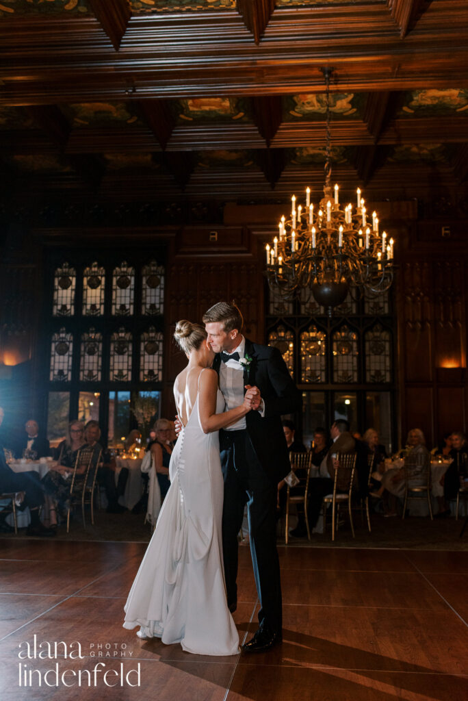 couple shares first dance at university club chicago wedding reception 