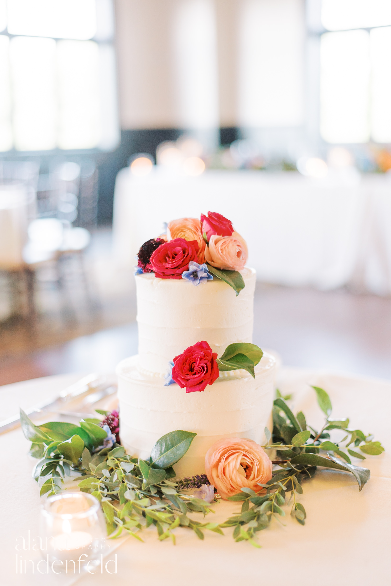 colorful wedding flowers on cake