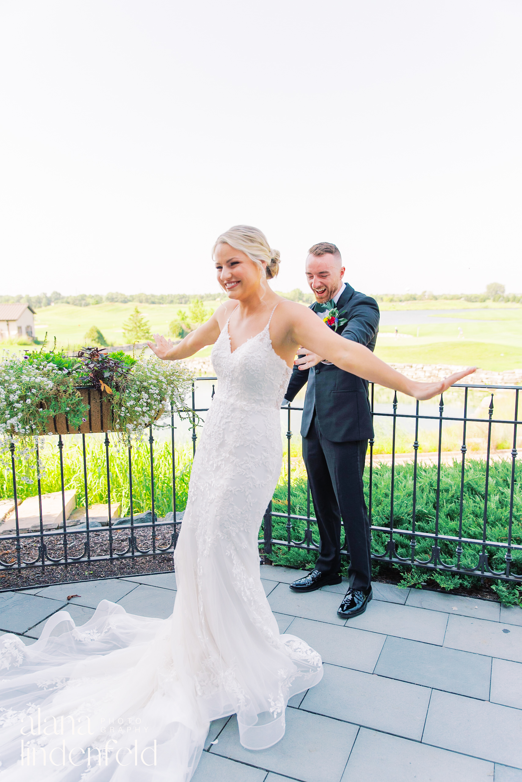bride has first look with groom at Mistwood Golf Club