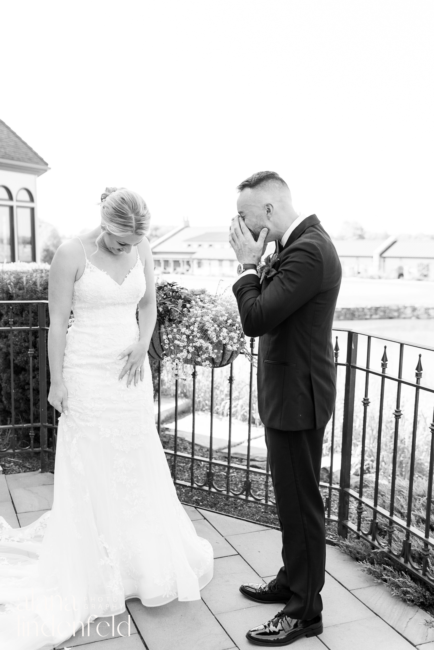bride has first look with groom at Mistwood Golf Club