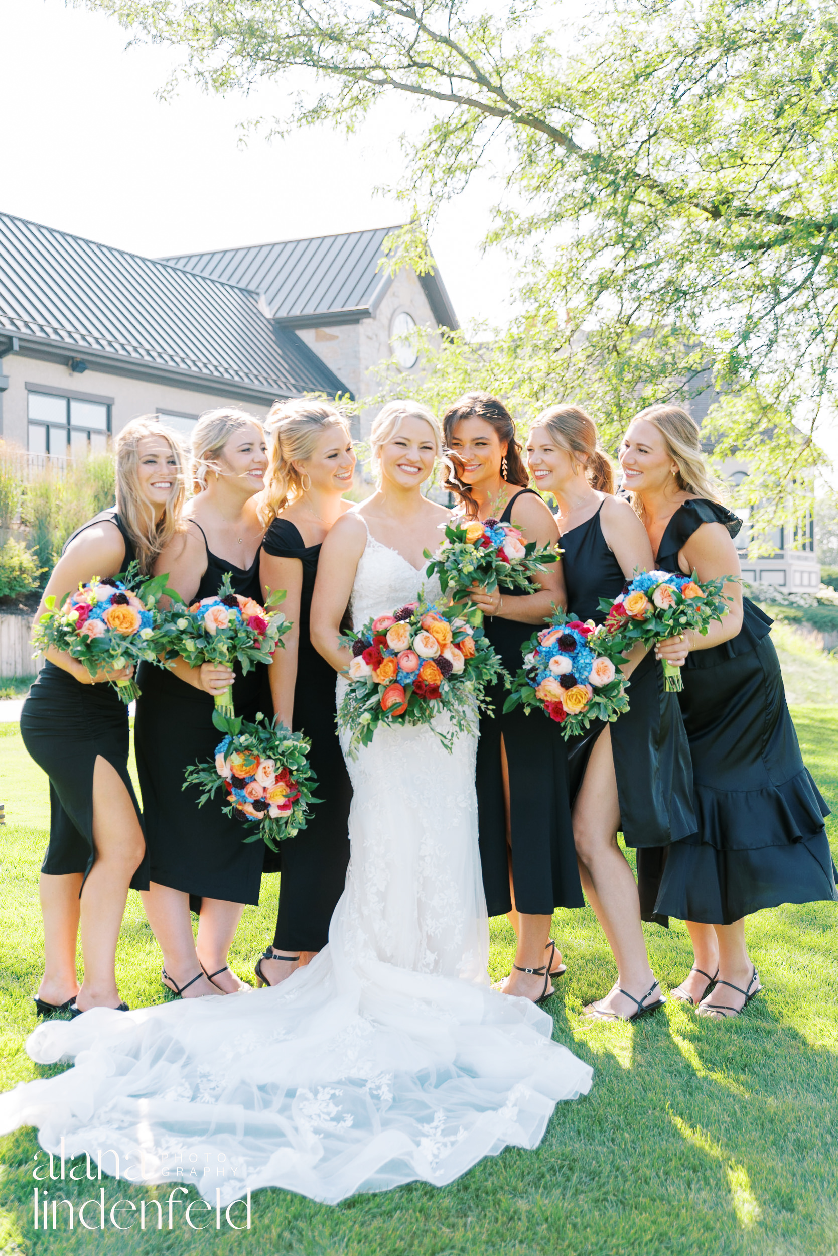 bridesmaids in black dresses at summer wedding at Mistwood Golf Club