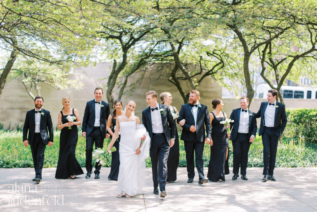 bride, groom, and wedding party in black at the Art Institute of Chicago Gardens 