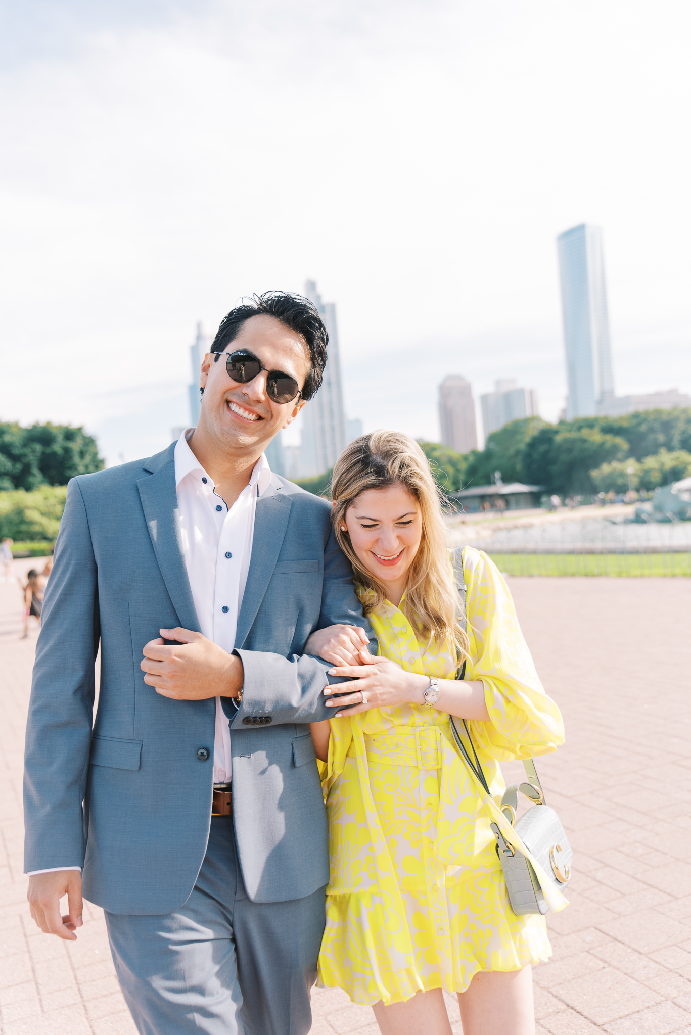 couple in blue suit and yellow dress for downtown Chicago engagement photos