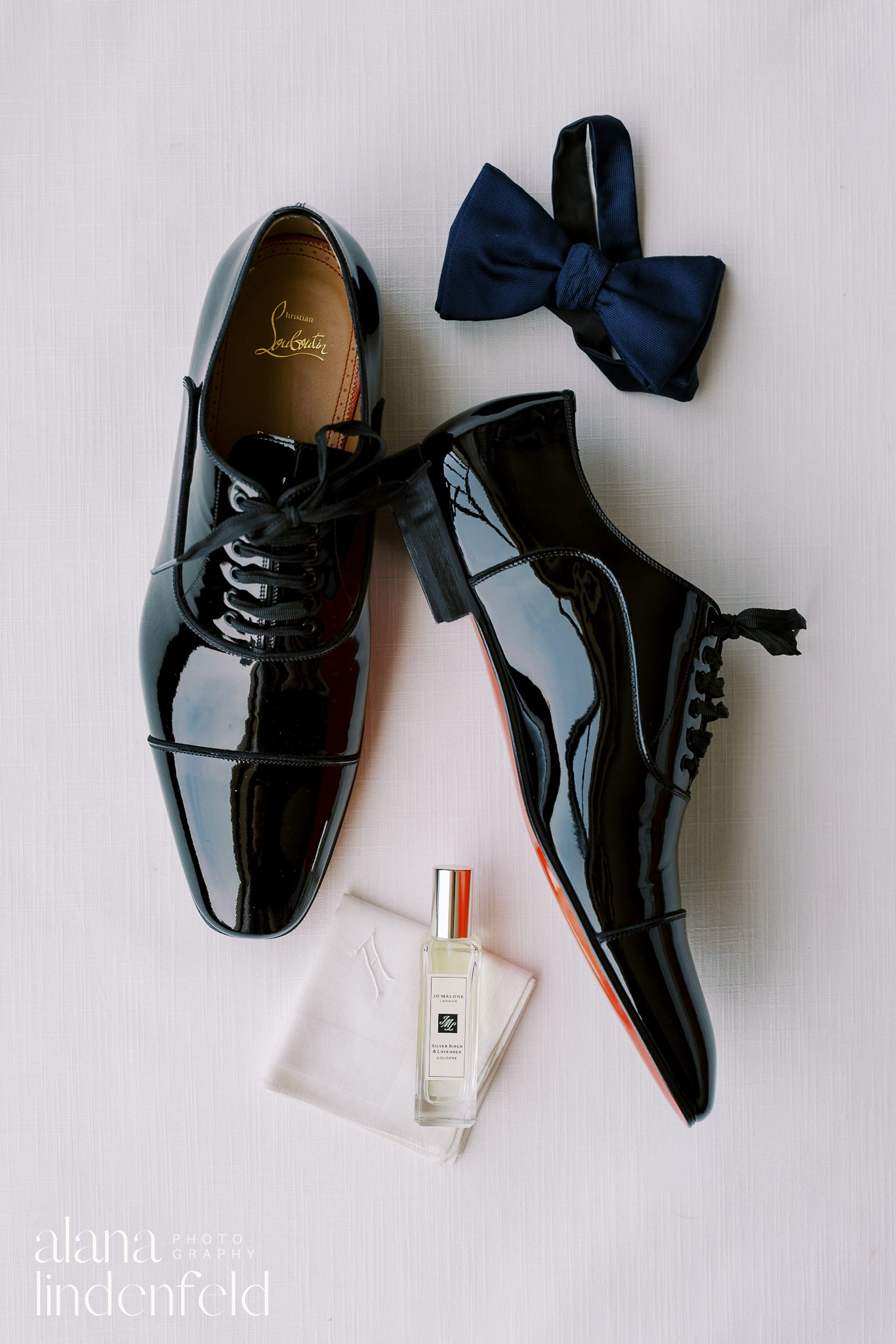 groom detail flat lay wedding day
