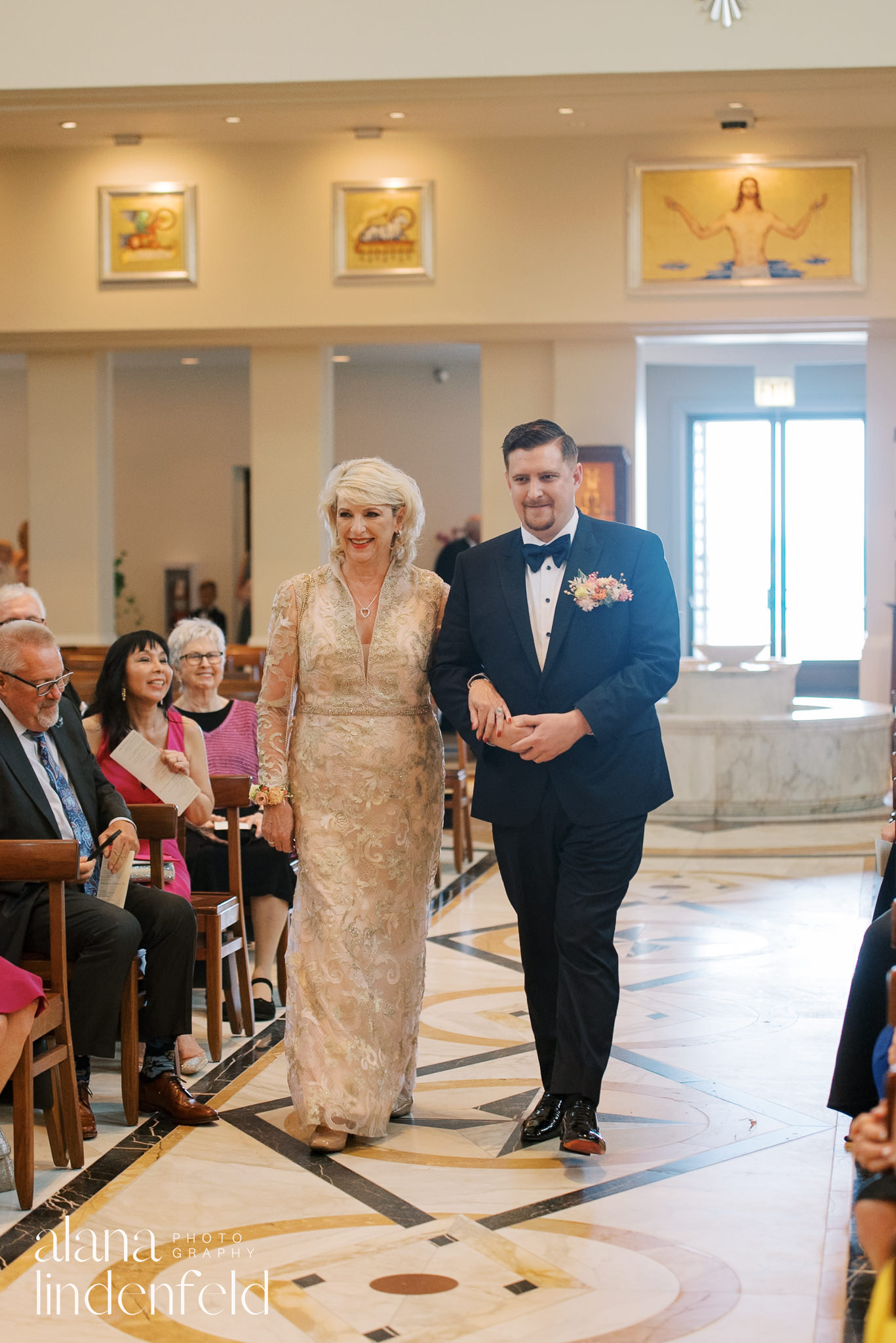 groom walking down church aisle at madonna della strada