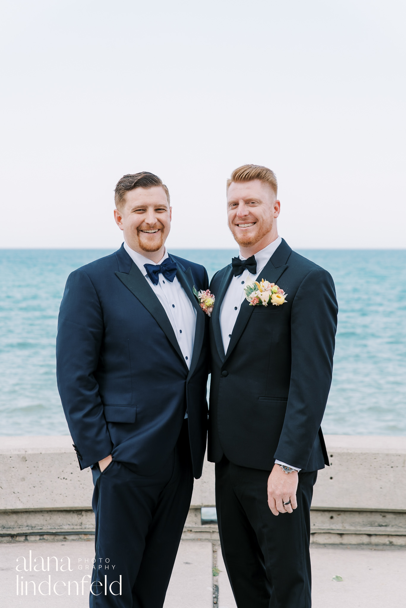 groom and groomsman smiling at loyola wedding