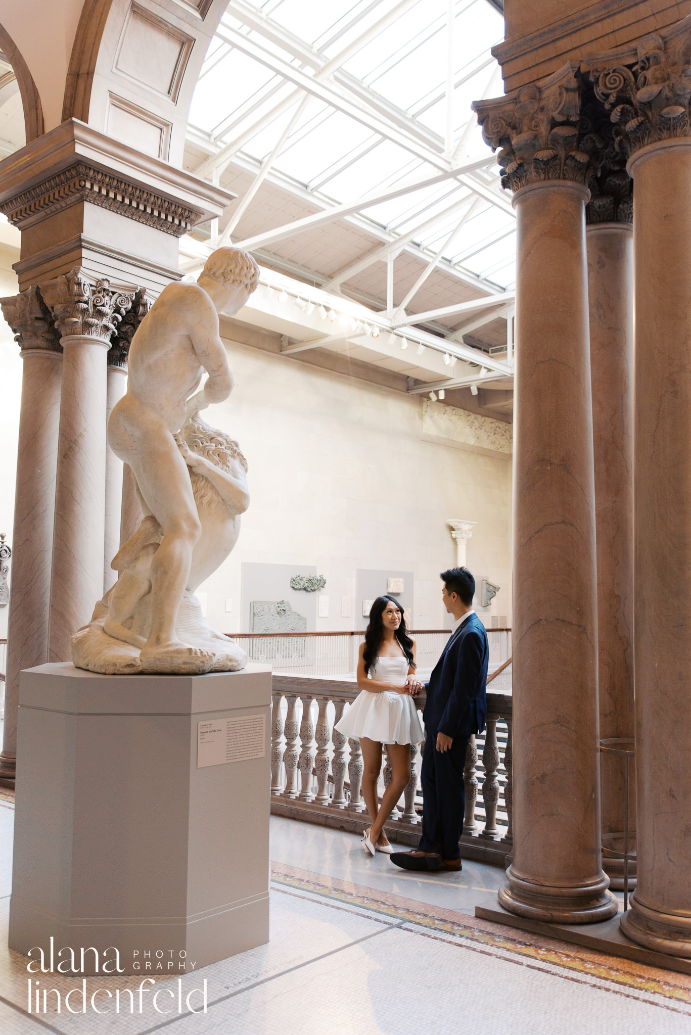 couple in white dress and navy suit at Art Institute of Chicago Proposal photos