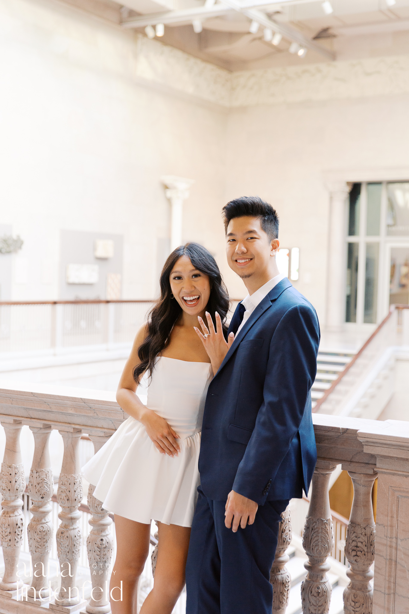 couple in white dress and navy suit at Art Institute of Chicago Proposal photos