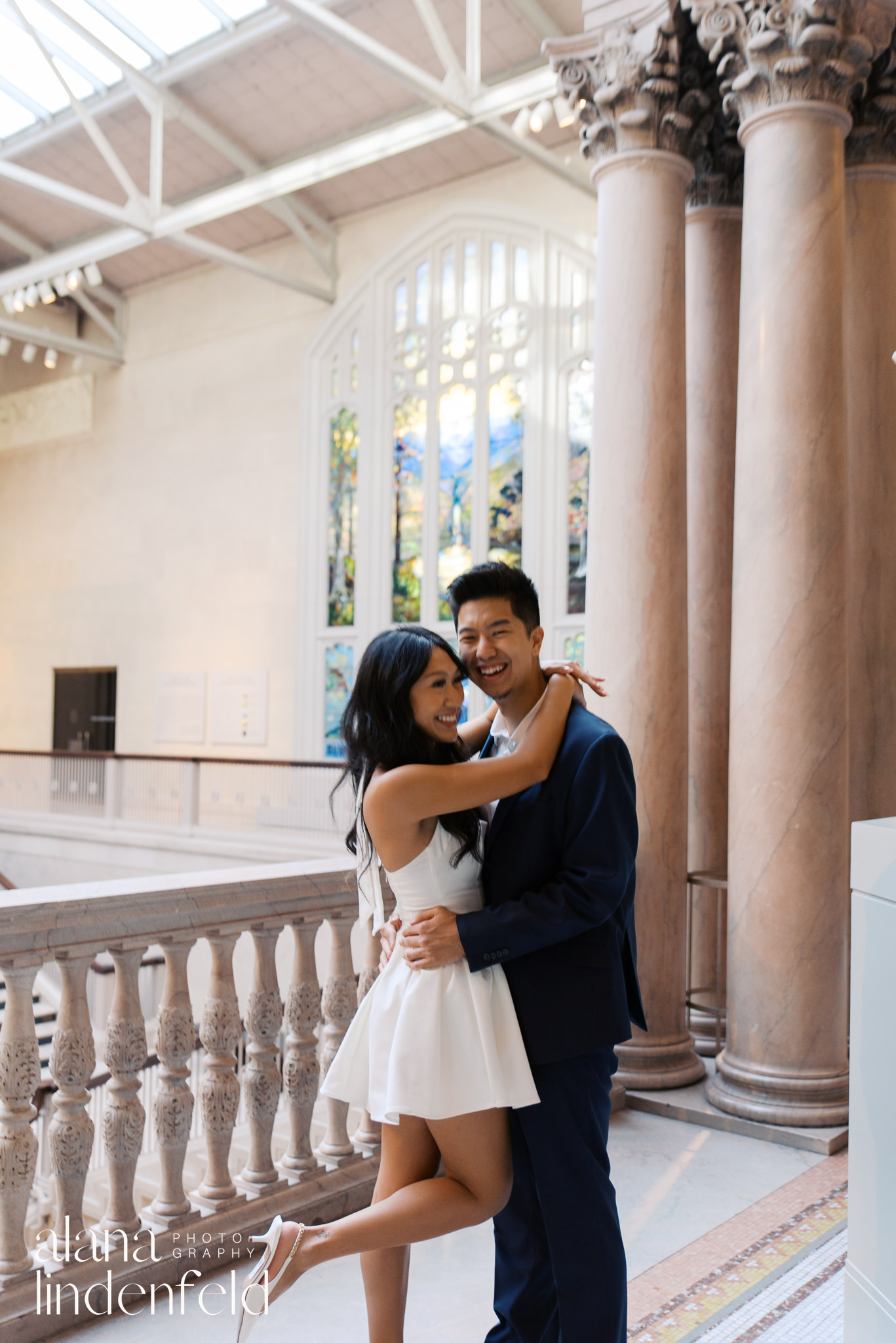 couple in white dress and navy suit at Art Institute of Chicago Proposal photos