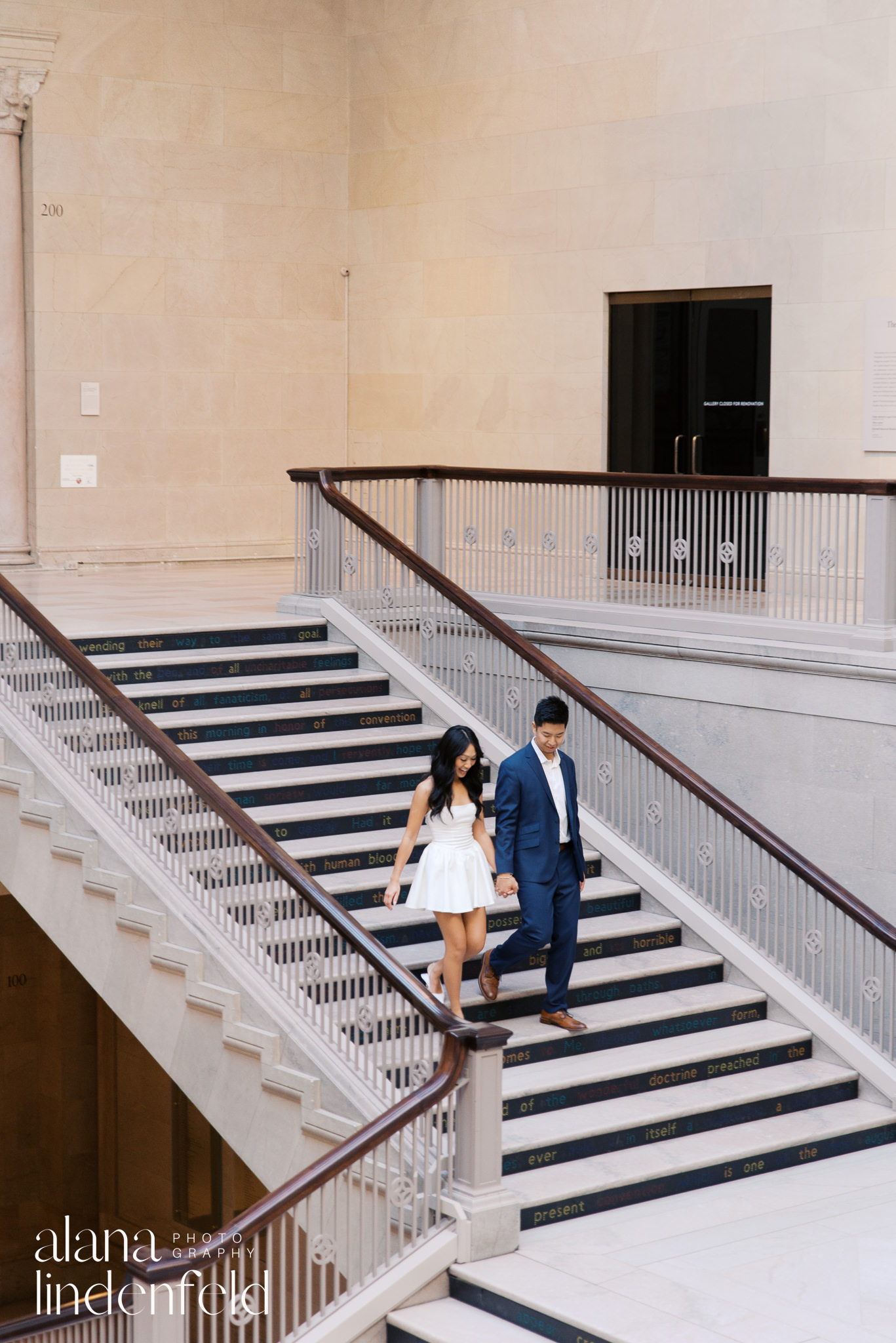 couple in white dress and navy suit at Art Institute of Chicago Proposal photos