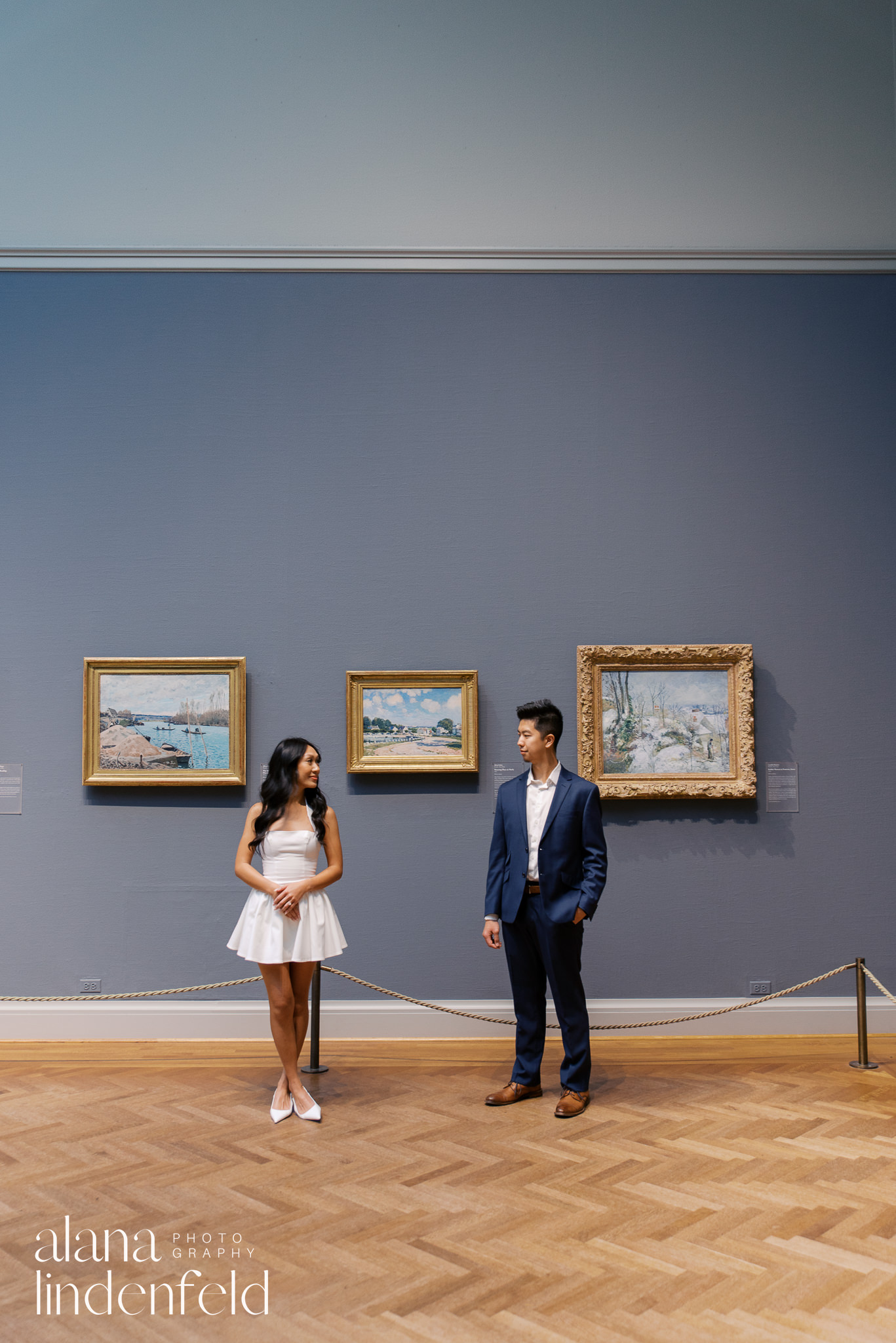 couple in white dress and navy suit at Art Institute of Chicago Proposal photos