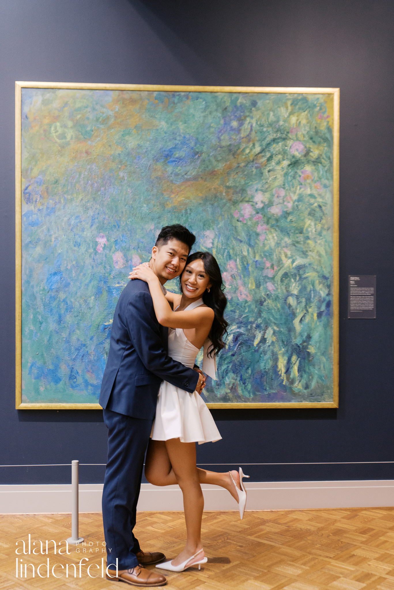 couple in front of Monet artworks at the Art Institute of Chicago engagement photos