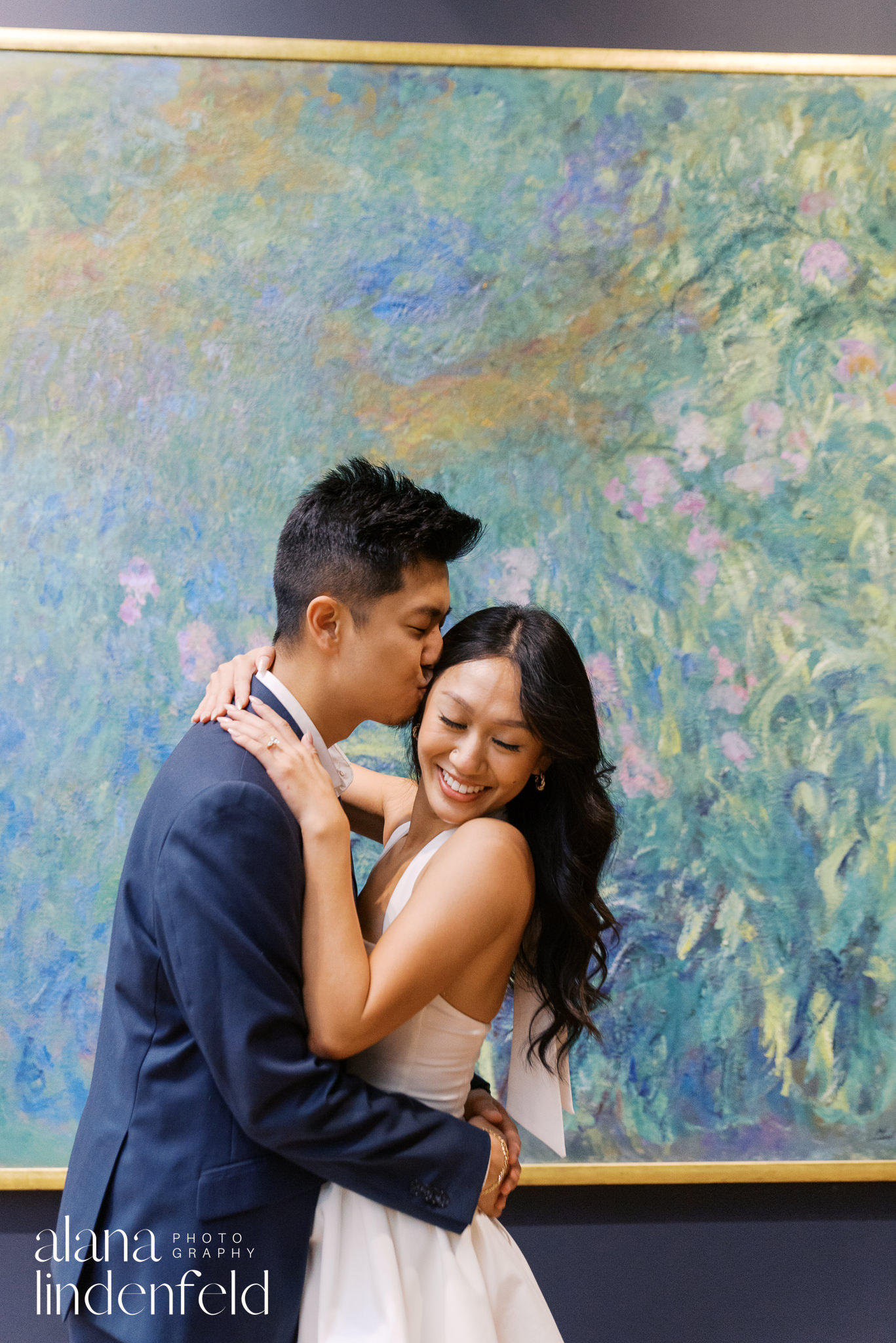 couple in front of Monet artworks at the Art Institute of Chicago engagement photos