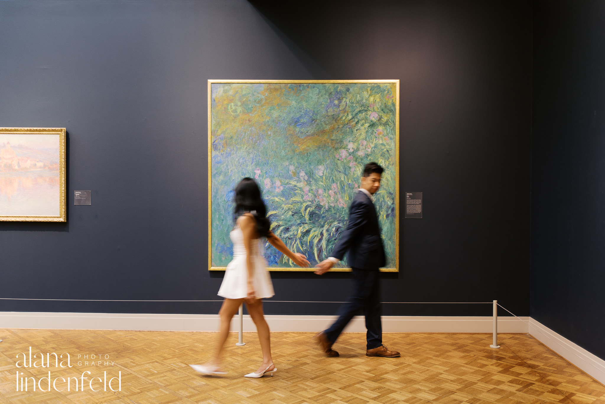 couple in front of Monet artworks at the Art Institute of Chicago engagement photos