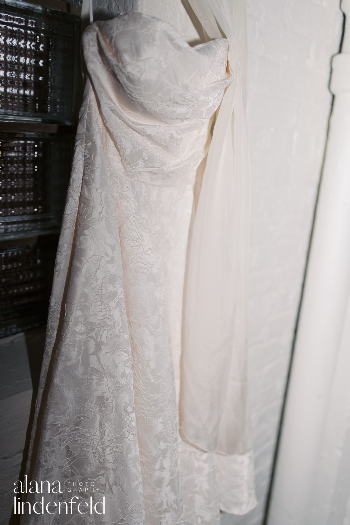 strapless wedding dress with scarf flash photography