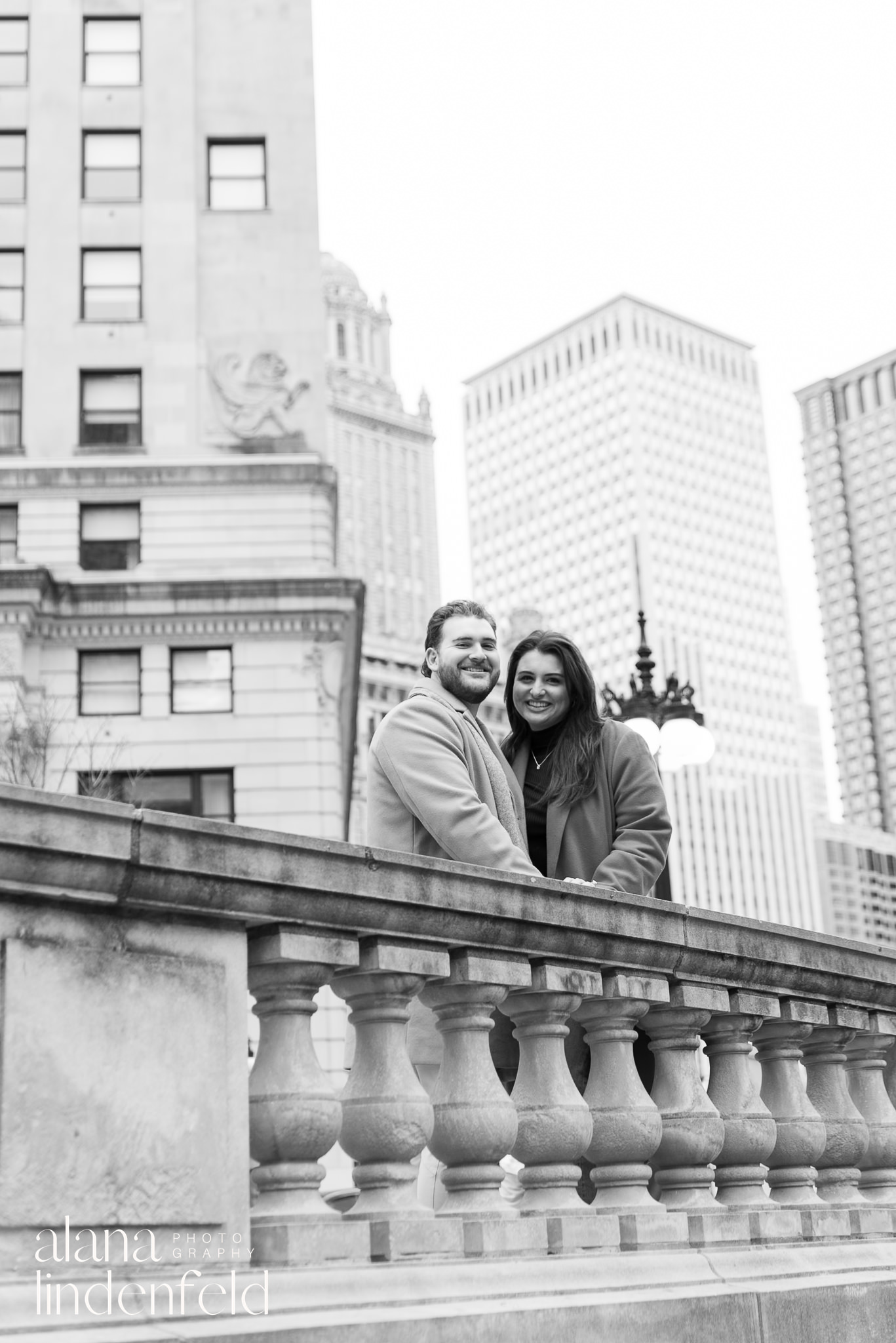 black and white engagement picture along the Chicago Riverwalk