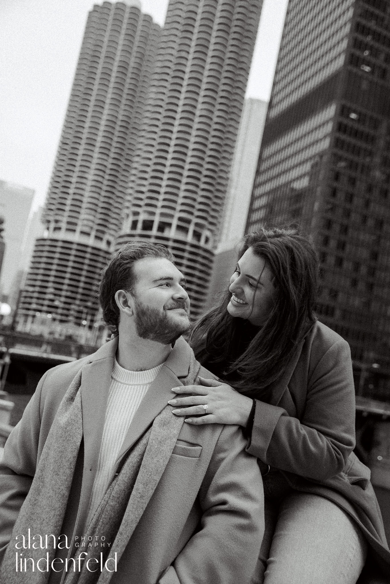 black and white engagement picture along the Chicago Riverwalk