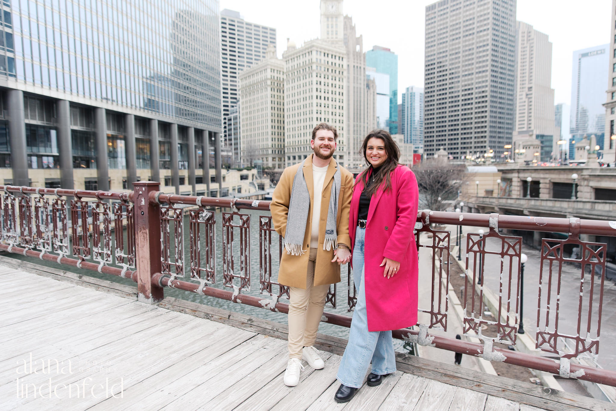 couple smiling with view of Chicago River 