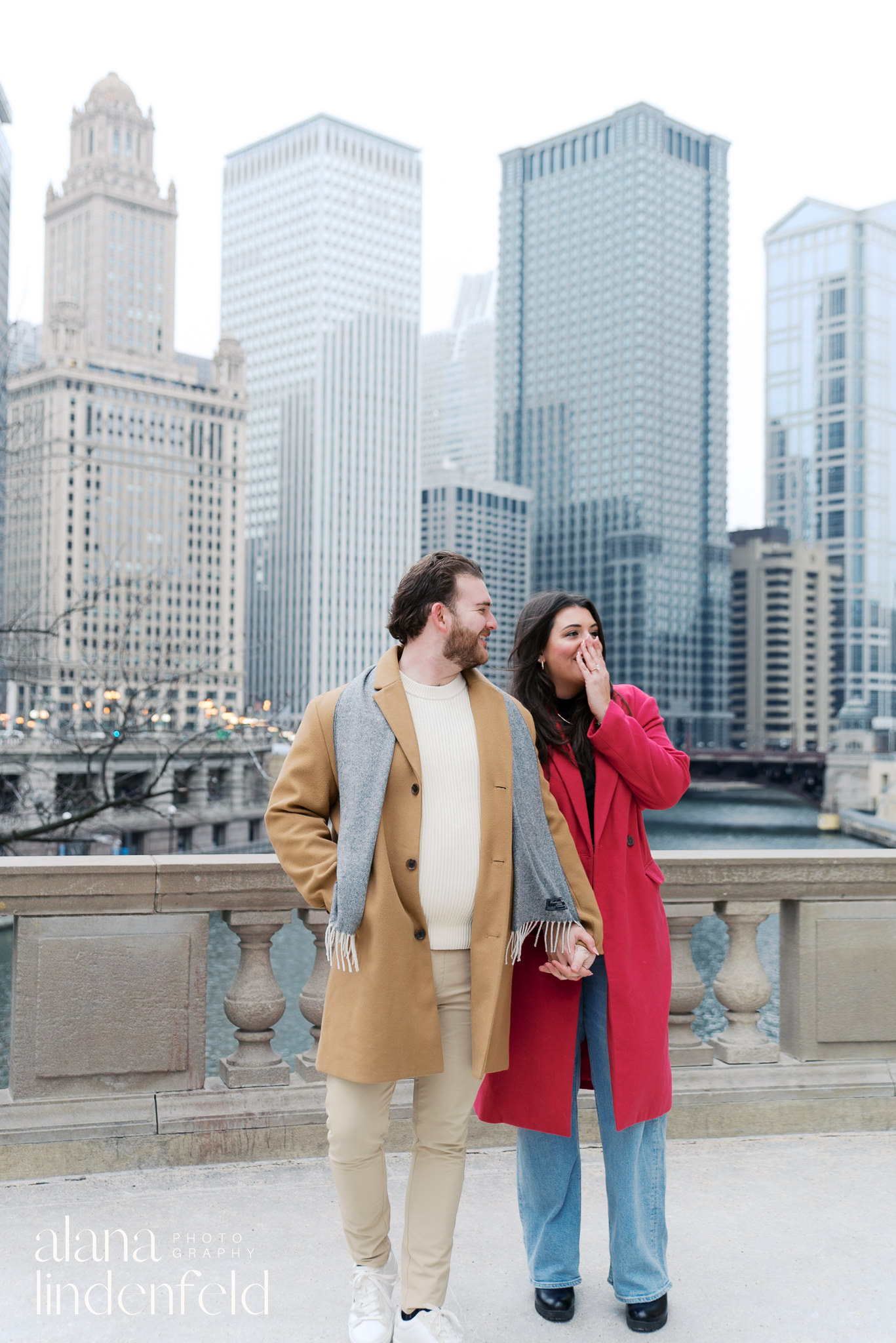 surprise proposal at Wrigley Building in the winter