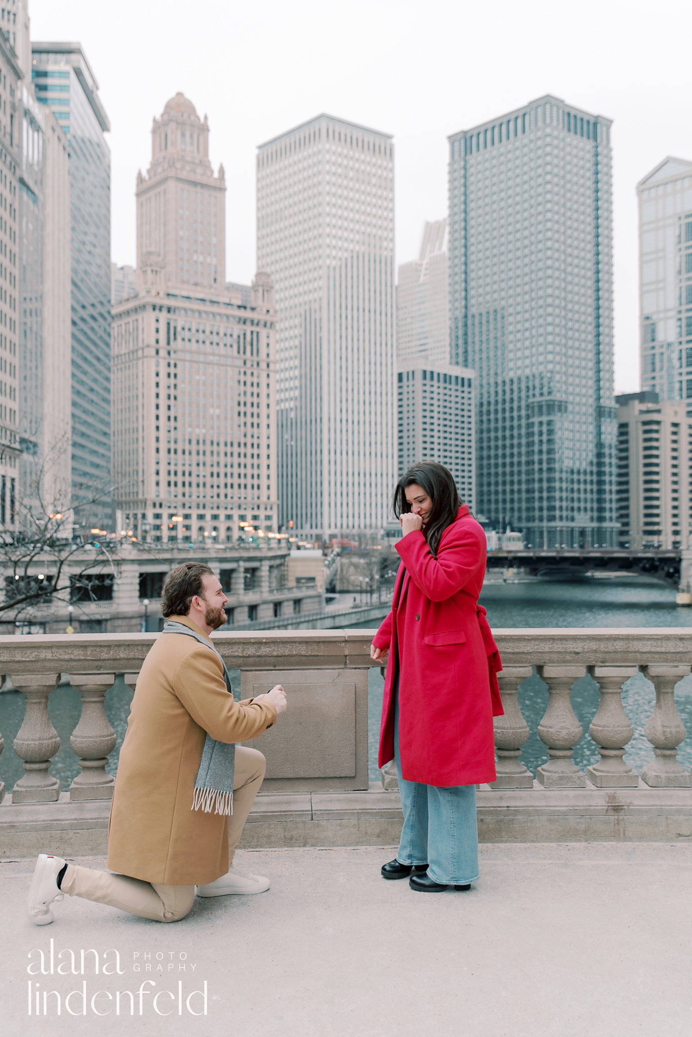 Proposal photos at Wrigley Building in Chicago in the winter