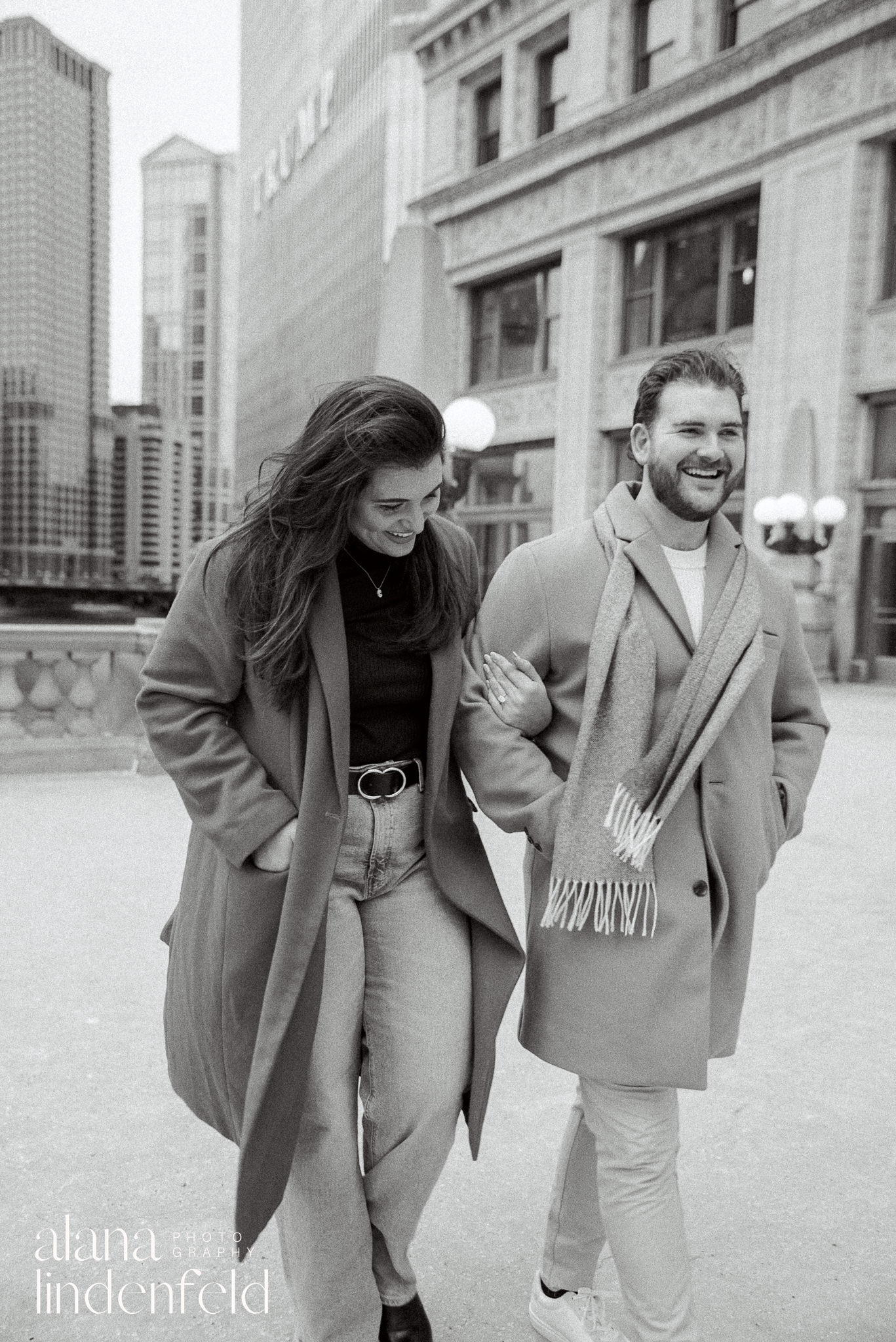 surprise proposal at Wrigley Building in the winter - black and white photos