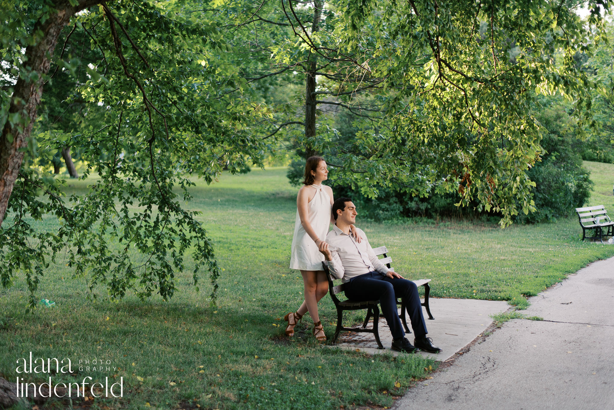 couple on a bench at North Pond in Lincoln Park for engagement pictures