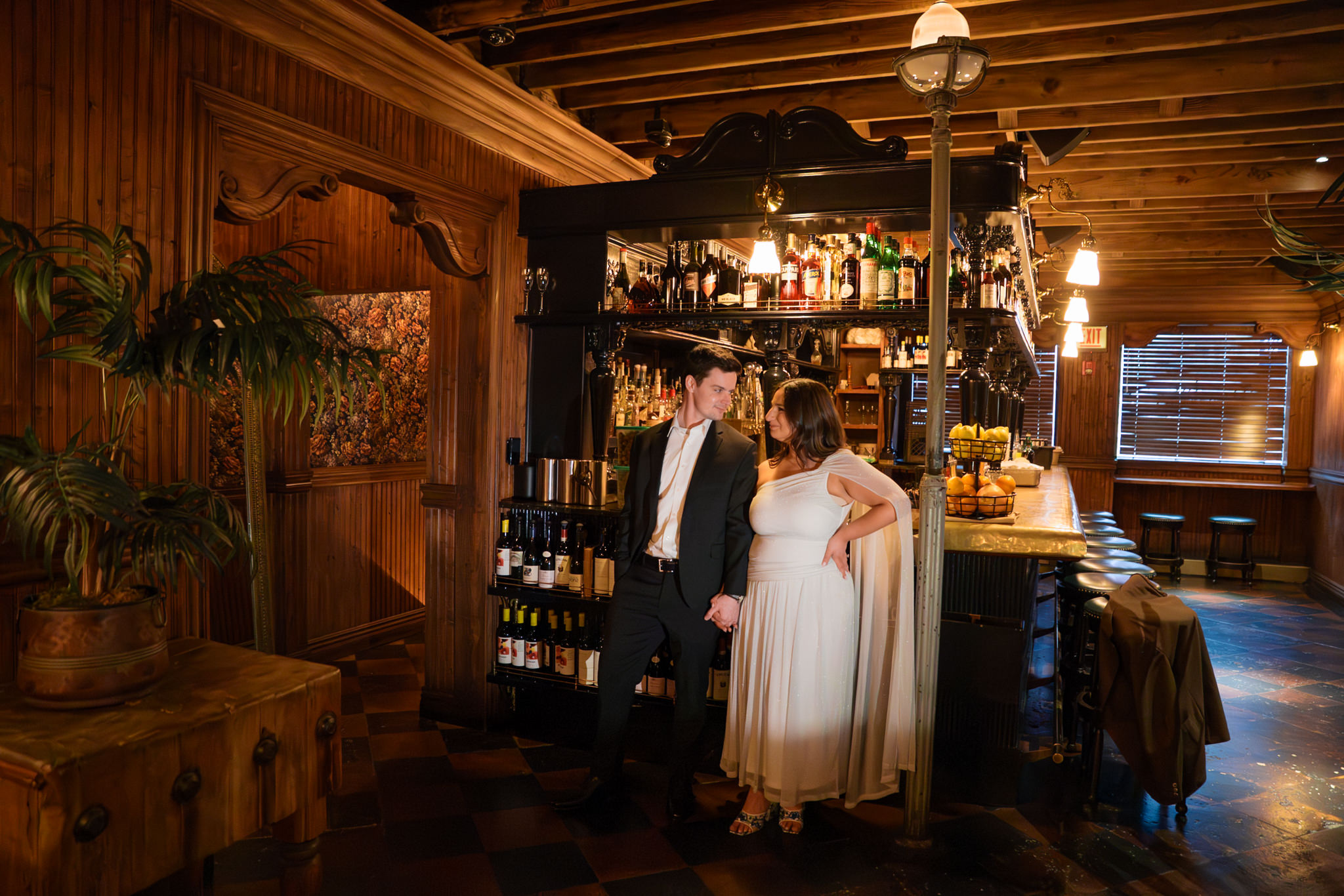 engagement pictures in a dimly lit bar at Gilt Bar Chicago